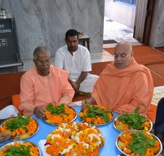 Swami Adhyatmanandai MAharaj performing Paduka Pooja at Sivananda Ashram Rishikesh along with Shri Swami Guha Bhaktananadaji Maharaj, Sivananda Ashram Maleshya